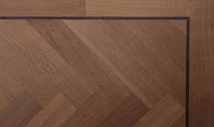 Eiken Visgraat Gestoomd Olie Woca Castle Grey - Knulst Houten Vloeren - Nunspeet - www.knulsthoutenvloeren.nl